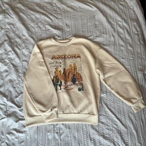 Cream Colored Crewneck with design